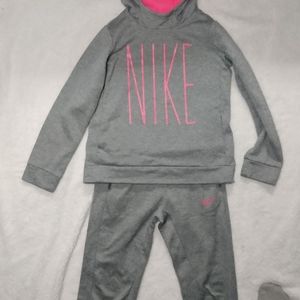 Gray and pink Nike sweatsuit. Large girls.